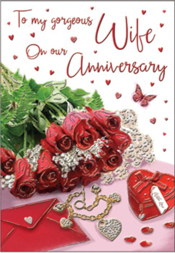 In this richly emotive anniversary card scene, a bouquet of classic red roses takes centre stage, as if carefully arranged on a table in a Bermondsey warehouse conversion. Each bloom is luxuriously full, petals tightly layered and slightly curled at the tips, creating a sense of depth and softness you can almost feel with your fingertips. The red hue is intense and reassuring, somewhere between scarlet and deep wine, evoking the warmth and constancy of long-standing love. Lush green foliage weaves around the roses, their smooth, glossy leaves adding freshness and contrast that make the blossoms seem even more vivid. Elegant wrapping or background elements in soft, neutral tones frame the flowers and set a refined stage for the surrounding details. Whisper-thin lace and delicate heart motifs draw the eye across the composition, guiding it towards scattered trinkets that suggest cherished memories: an understated jewellery set glimmering gently and a vivid red box that looks ready to reveal a meaningful anniversary gift. The textures in the image play off each other - the silky petals, the cool shine of polished metal, the soft grain of paper - echoing the variety of surfaces you might find in a lovingly styled SE1 home. The scripted message on the card flows with graceful curves, adding a literary, almost handwritten charm to the design. Every element, from the hearts to the jewellery, has been placed with care, creating a balanced, romantic tableau. It feels like a warm embrace captured on paper, a gentle yet powerful visual reminder of years spent growing together and of many more anniversaries waiting beyond the cobbled streets and converted arches of Bermondsey.